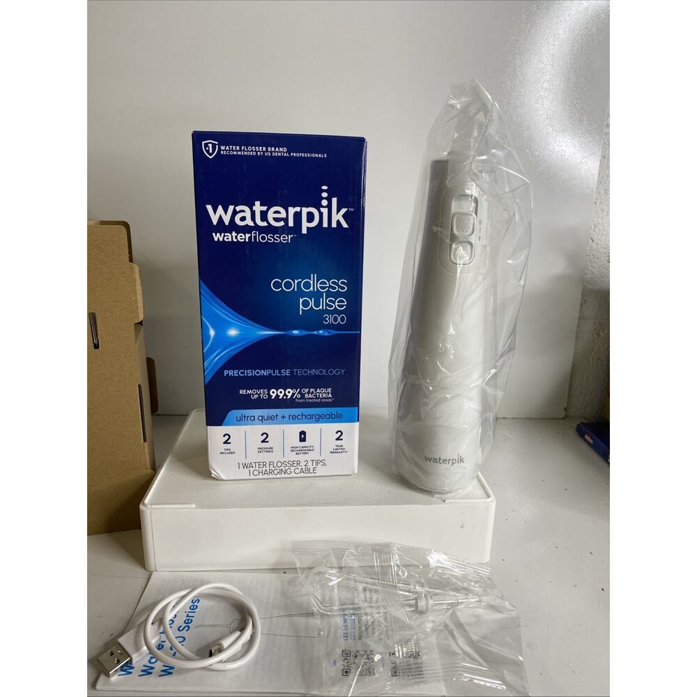 Waterpik Cordless Pulse 3100 Rechargeable Portable Water Flosser Teeth